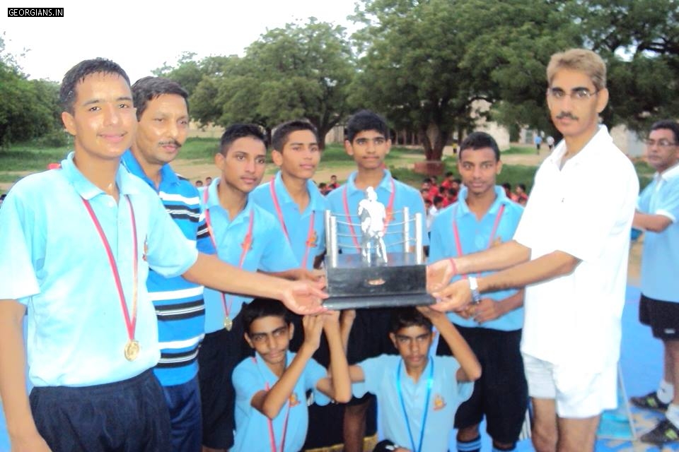 Inter house boxing champions with trophy