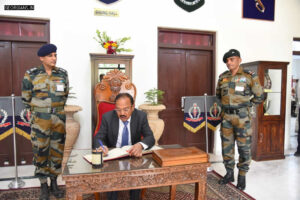 Ajit Doval penning down his memoirs in the School Visitor Book