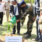 Ajit Doval planting a tree sapling at school premises