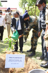 Ajit Doval planting a tree sapling at school premises