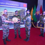 Principal presenting school momento to General Bipin Rawat, PVSM, UYSM, AVSM, YSM, SM, VSM, ADC