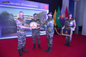 Principal presenting school momento to General Bipin Rawat, PVSM, UYSM, AVSM, YSM, SM, VSM, ADC